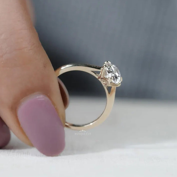 Minimalist oval engagement ring