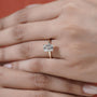 Sleek emerald cut diamond ring