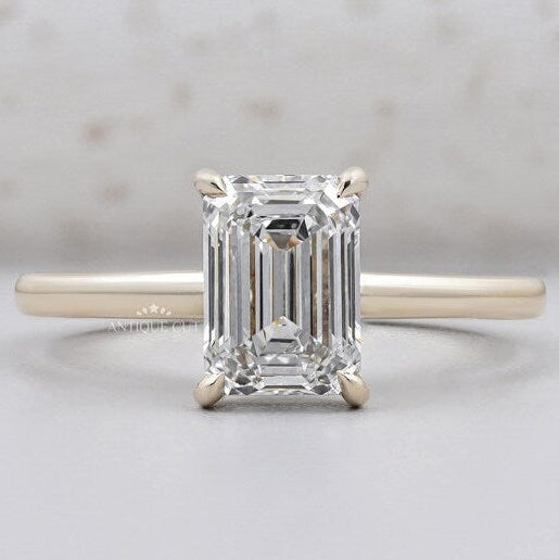 Emerald cut engagement ring with hidden halo