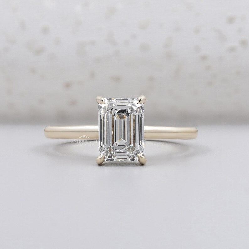 Emerald cut engagement ring with hidden halo