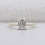 Emerald cut engagement ring with hidden halo