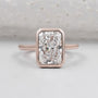 Radiant cut engagement ring bezel set in rose gold