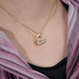Stylish CM diamond pendant in gold