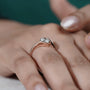 contemporary half bezel oval engagement ring
