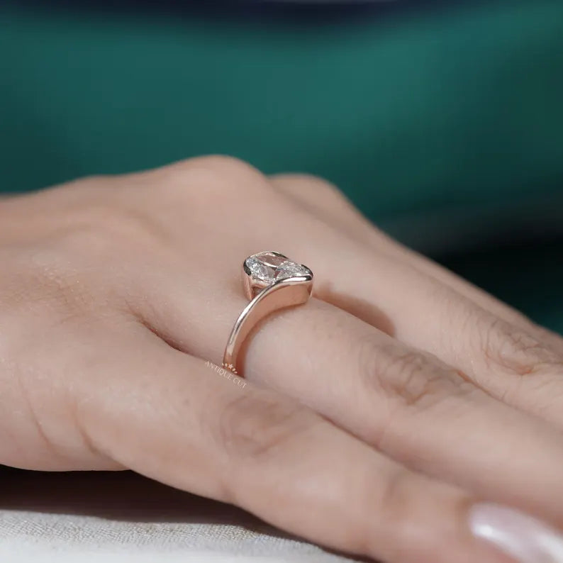oval diamond engagement ring with curved band