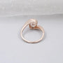 oval diamond engagement ring with bypass band