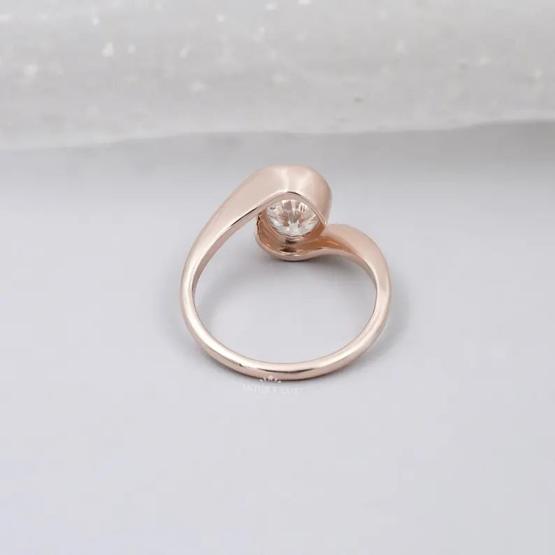 oval diamond engagement ring with bypass band