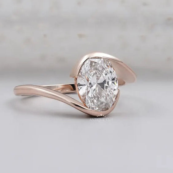 bypass setting oval diamond engagement ring