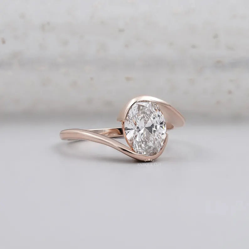 bypass setting oval diamond engagement ring