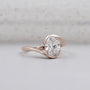 bypass setting oval diamond engagement ring