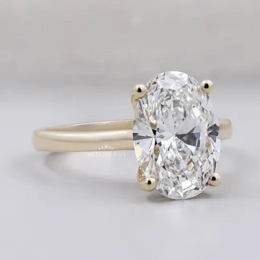 oval diamond solitaire ring in yellow gold
