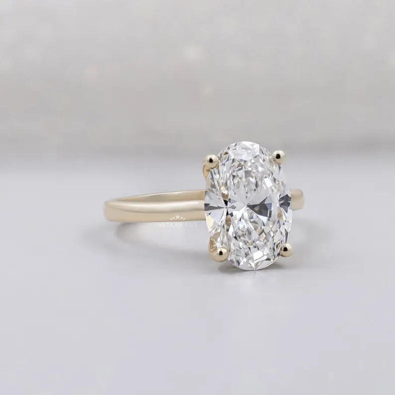oval diamond solitaire ring in yellow gold