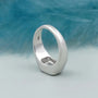 modern bezel set diamond emerald engagement ring