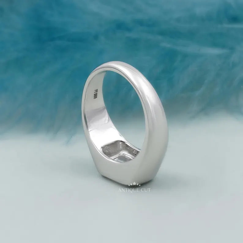 modern bezel set diamond emerald engagement ring