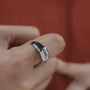 contemporary bezel set emerald engagement ring