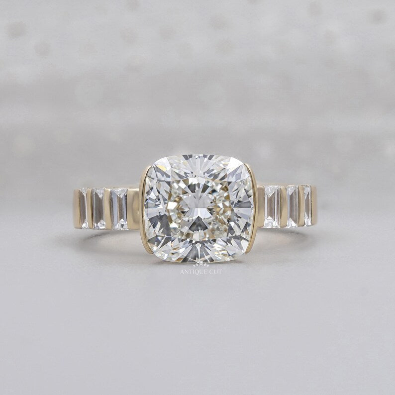 East west cushion cut engagement ring yellow gold