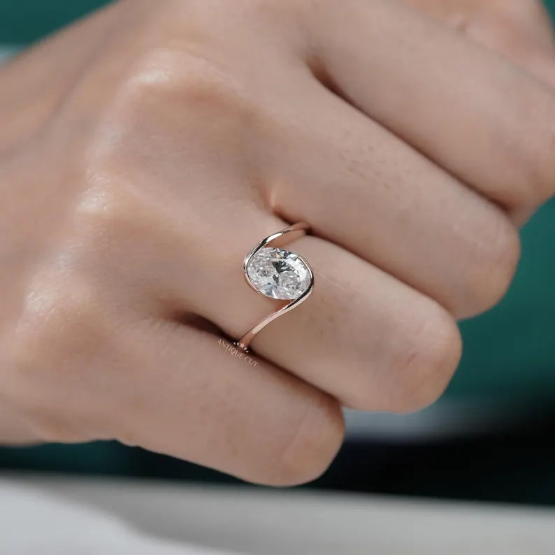 half bezel diamond ring in rose gold