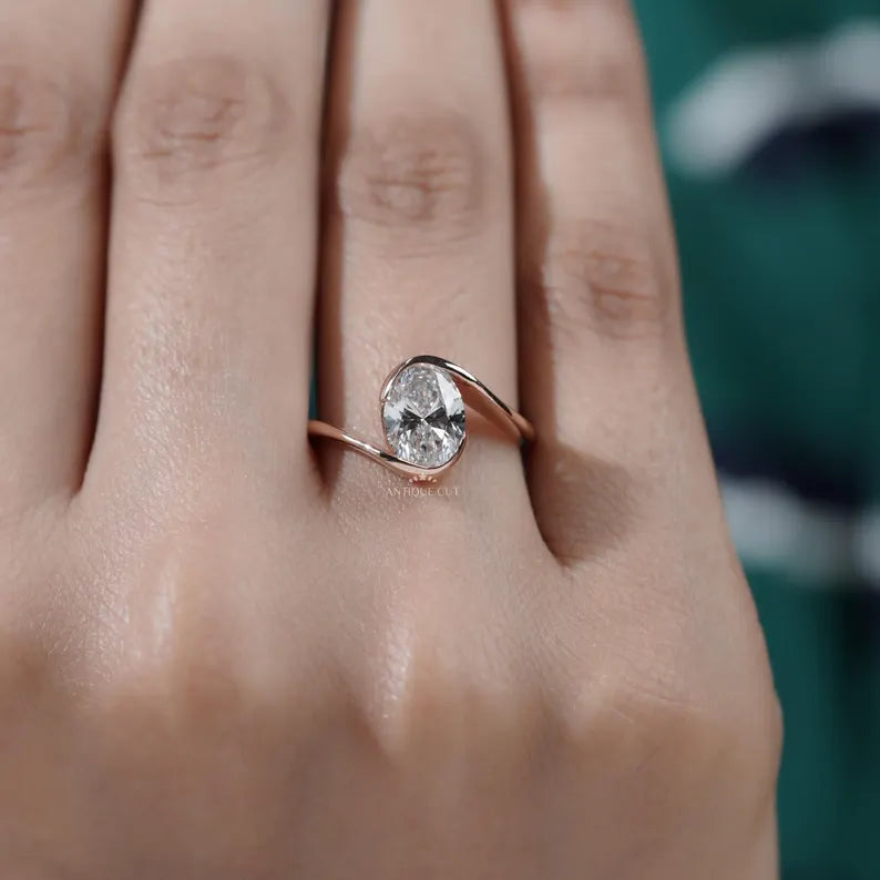 unique bypass setting oval engagement ring