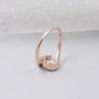 modern half bezel oval engagement ring