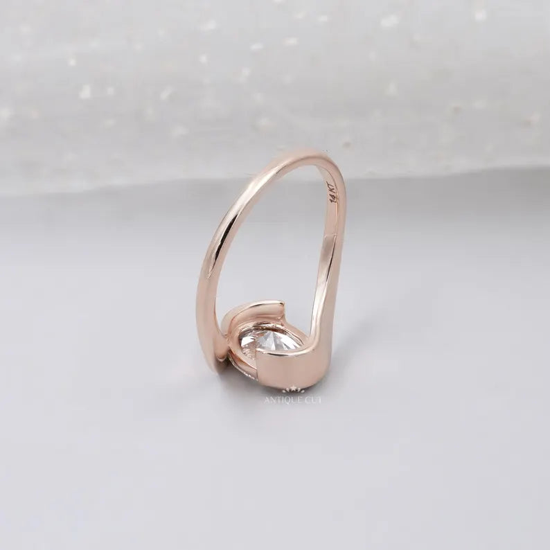 modern half bezel oval engagement ring
