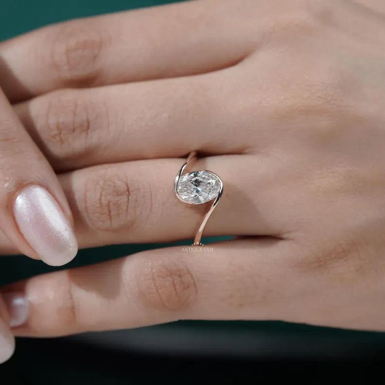 elegant rose gold oval engagement ring