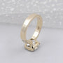 Half bezel cushion diamond ring yellow gold