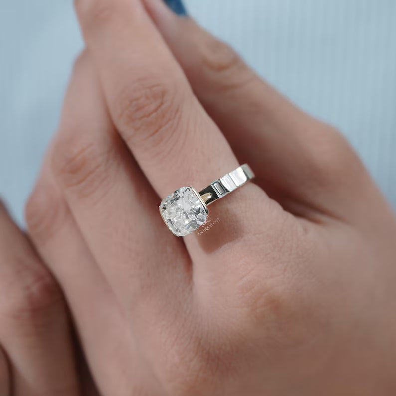 East West Cushion Cut Engagement Ring With Half Bezel