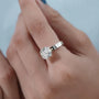 Modern east west cushion engagement ring