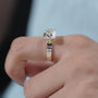 Sleek half bezel cushion cut ring