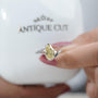White gold pear diamond ring angled view