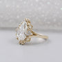 Pear diamond ring with halo engagement design