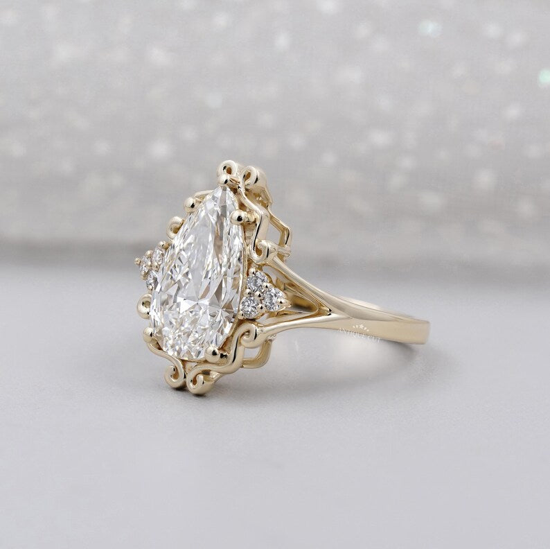 Pear diamond ring with halo engagement design