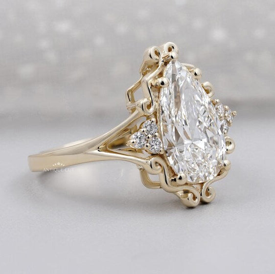Yellow gold pear cut diamond ring close-up