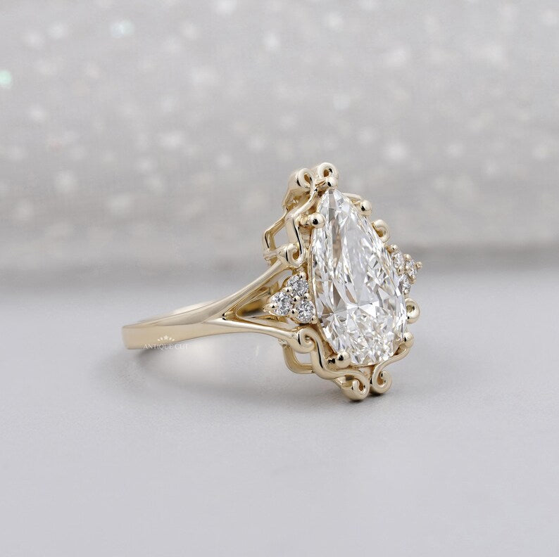 Yellow gold pear cut diamond ring close-up