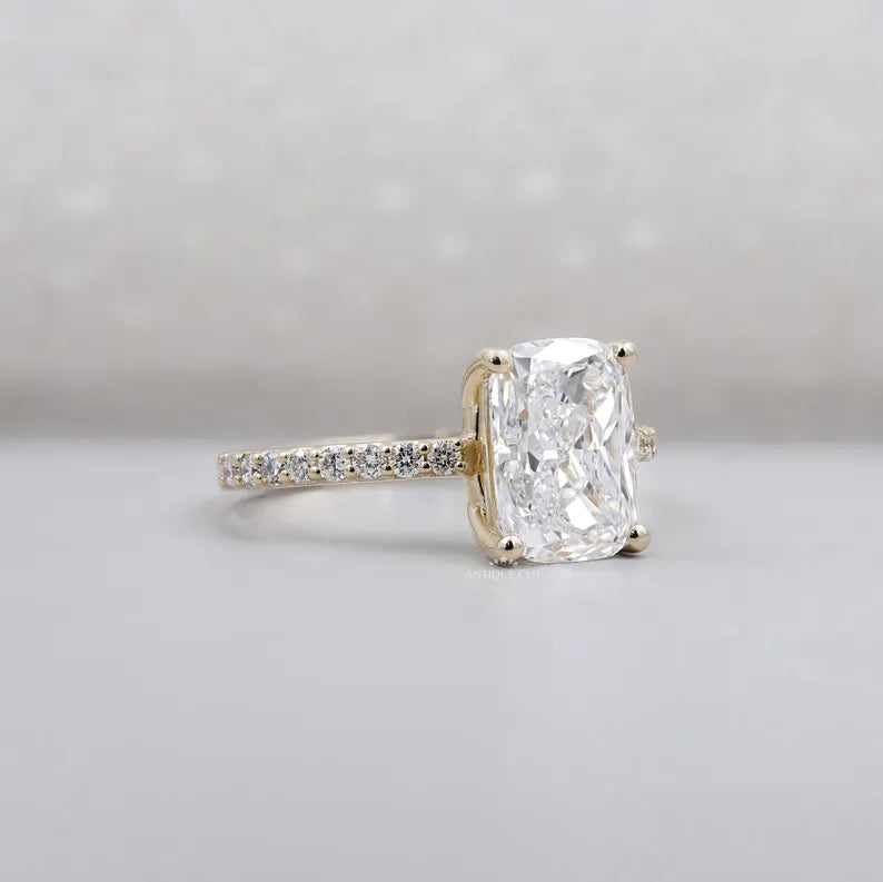 Yellow gold cushion cut diamond ring