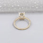 Pave diamond ring band with cushion cut center