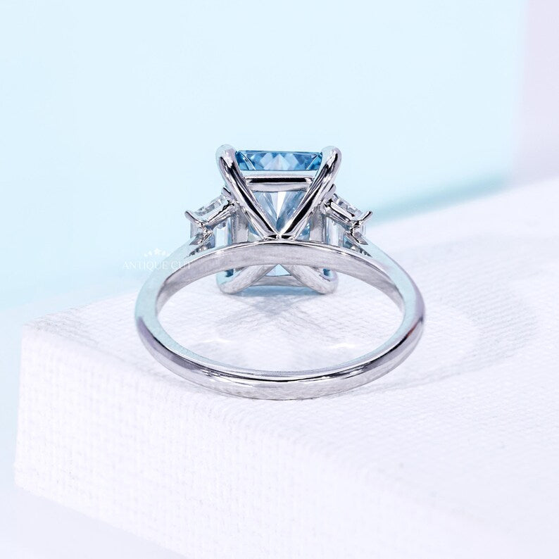 Fancy Blue Radiant Cut Diamond Ring With Trapezoid Side Stones