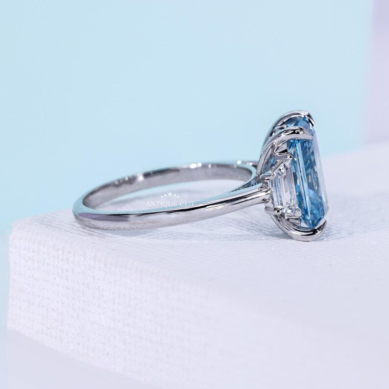 Fancy Blue Radiant Cut Diamond Ring With Trapezoid Side Stones