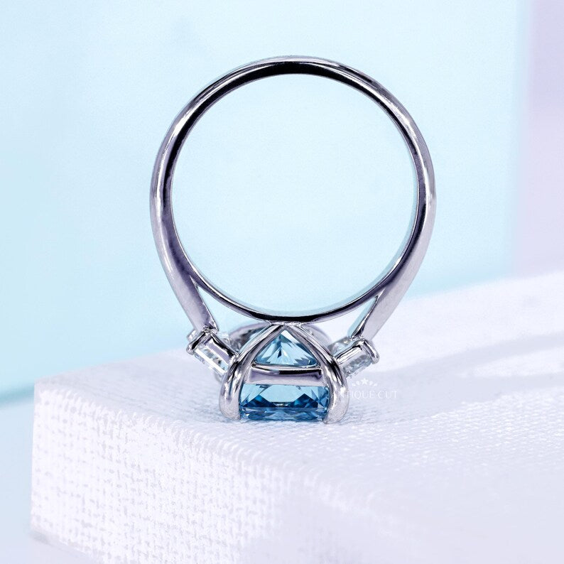 Fancy Blue Radiant Cut Diamond Ring With Trapezoid Side Stones