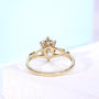 Nature inspired engagement ring featuring floral vine details