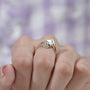 Rear view of round diamond ring with split bypass shank