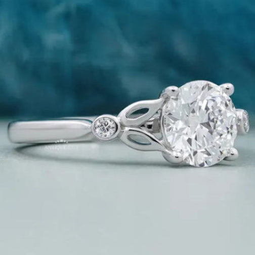Round Cut Diamond Engagement Ring with Leaf Side Accents in White Gold | IGI Certified