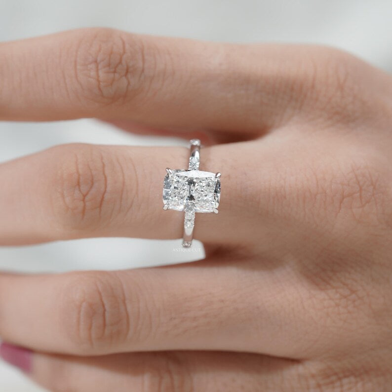 Fine jewelry cushion cut engagement ring with hidden halo for weddings and proposals.