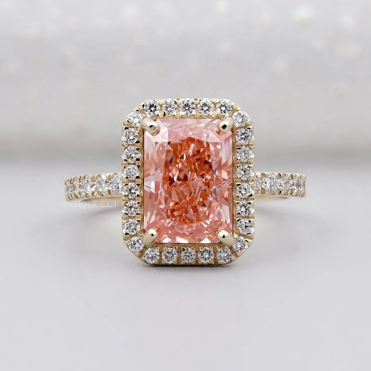 Fancy Pink Radiant Cut Diamond Ring With Halo Setting And Pave Band | IGI Certified