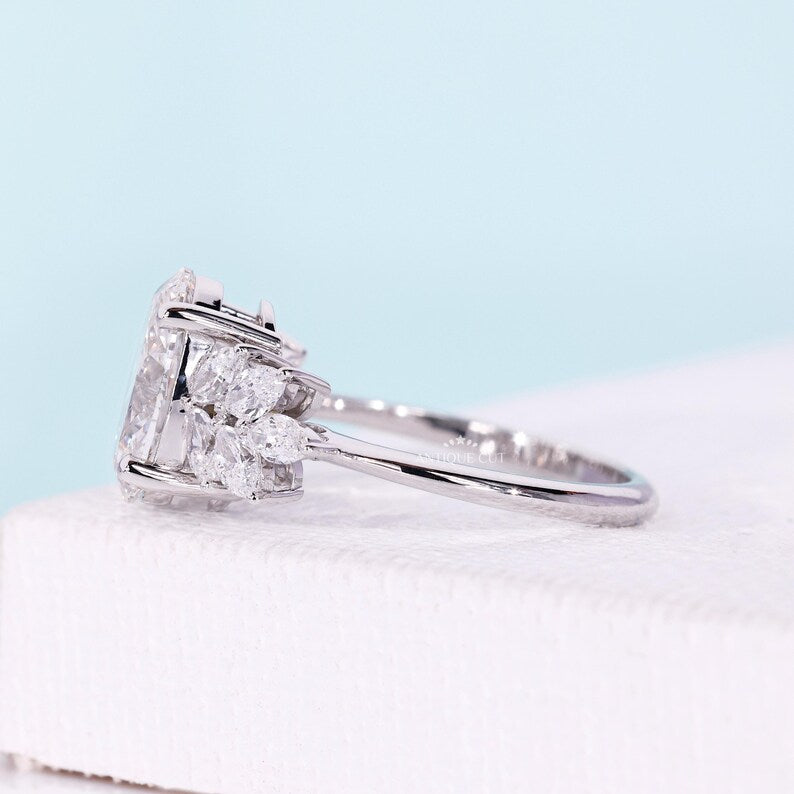 IGI certified oval cut diamond engagement ring with unique side accents