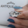Modern White Gold Square Emerald Cut Diamond Engagement Ring with Elegant Three Stone Setting