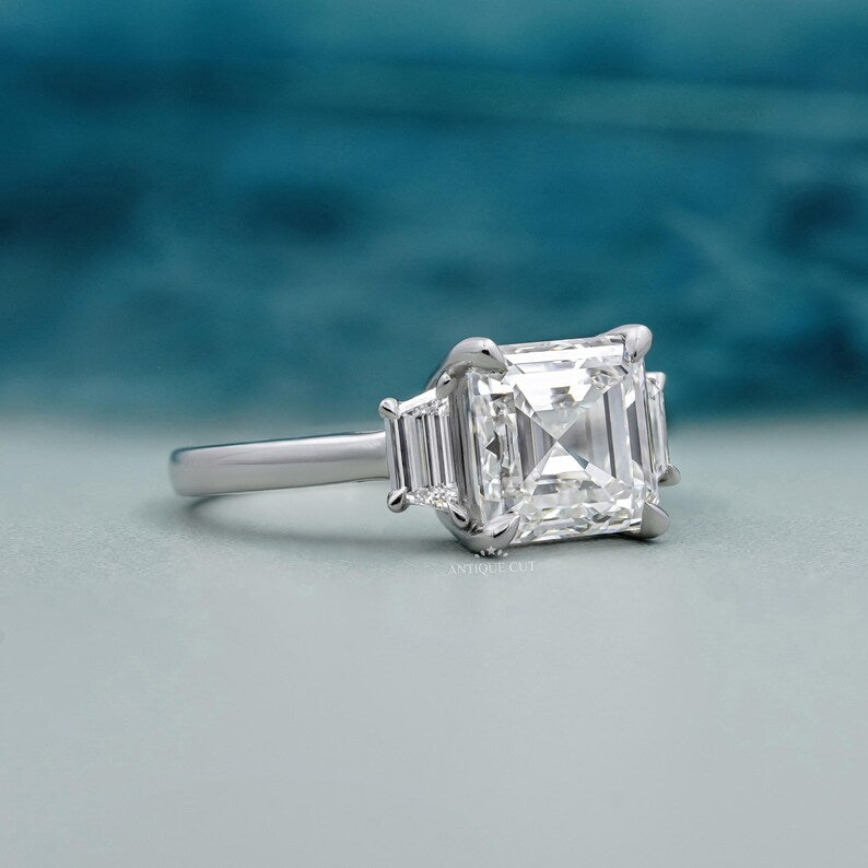 Three Stone Square Emerald Cut Diamond Ring with Classic Four Prong Setting