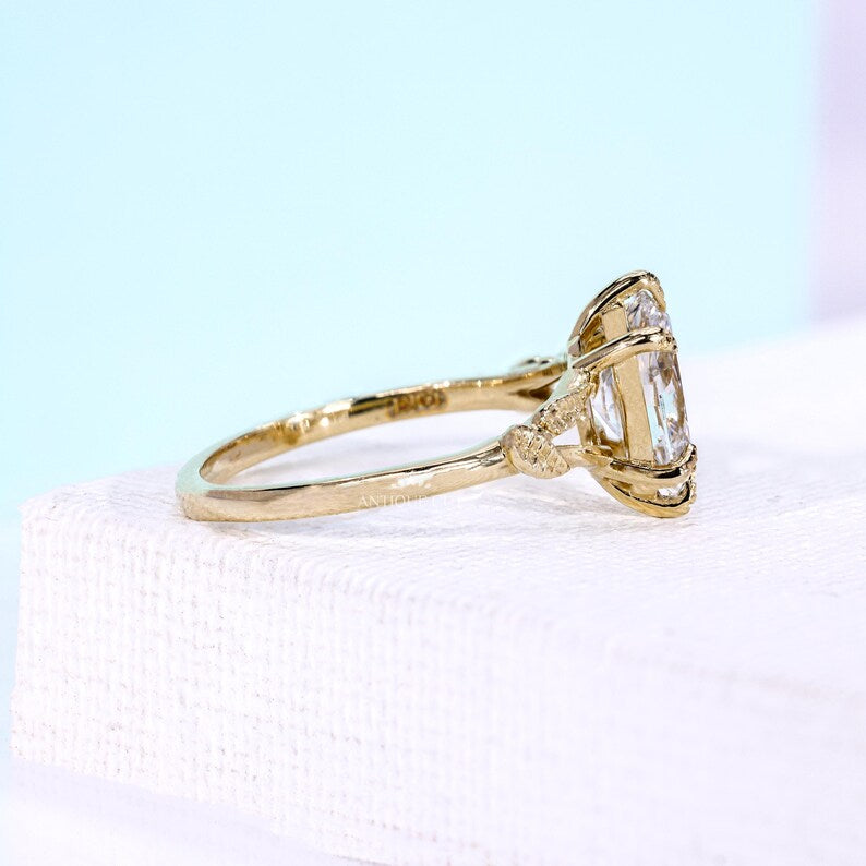 Lab grown oval diamond ring with botanical inspired setting