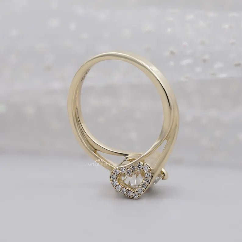 Round lab grown diamond secured in a bypass setting