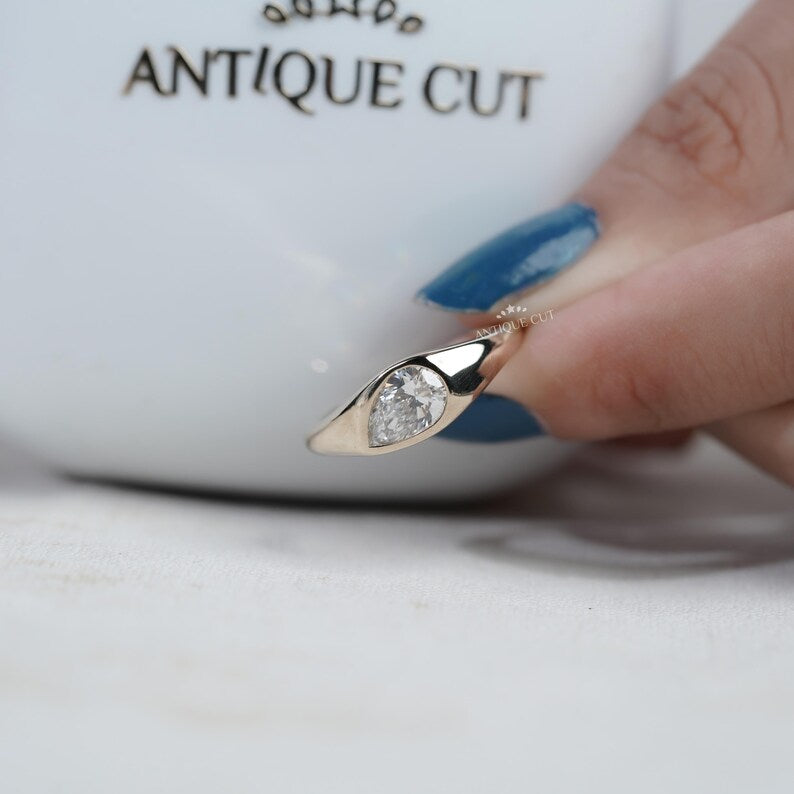 Yellow gold low set diamond ring without raised prongs